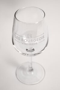 Stemmed wine glass with Les Bourgeois Vineyards logo